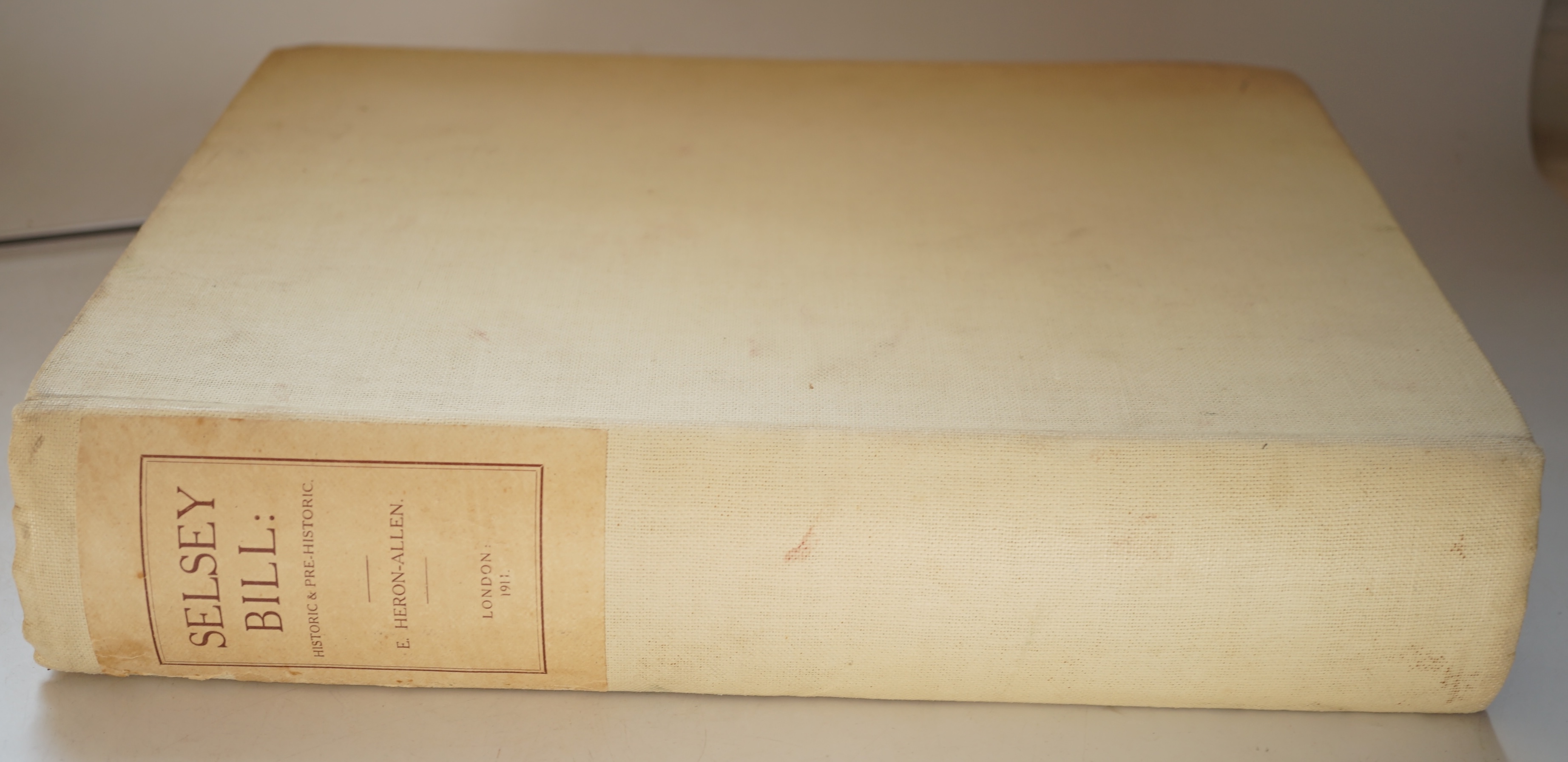 Heron-Allen, Edward - Selsey Bill: Historic and Prehistoric, 4to, cream buckram, author's presentation inscription to half title, numerous plates, 3 folding maps to rear pocket, Duckworth & Co., London, 1911.